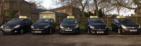 Wigham Driving School instructors and cars